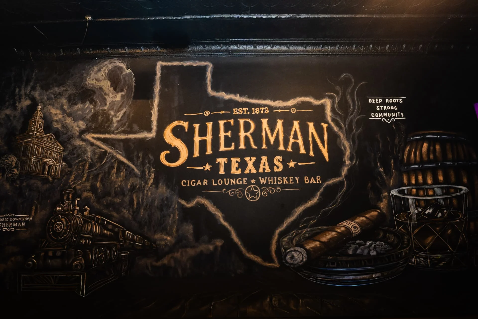 Sherman, Texas mural behind guests at Ash & Barrel