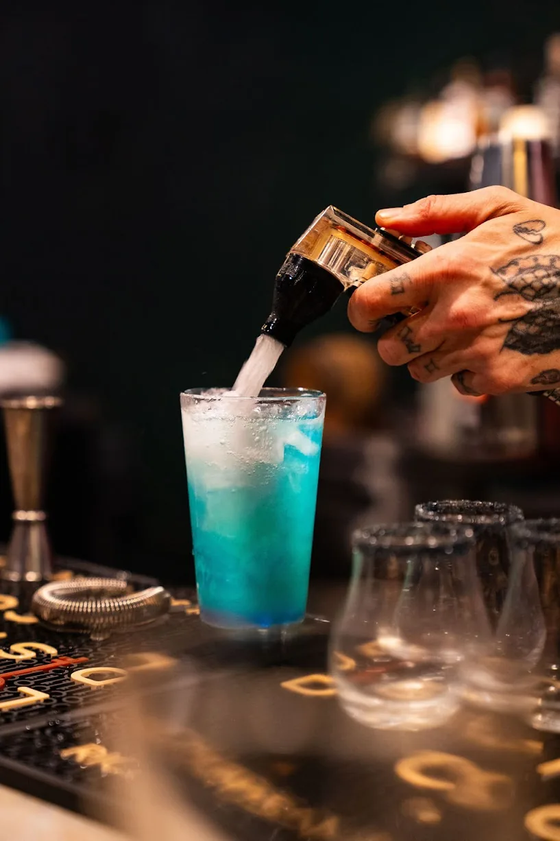 Pouring a cocktail